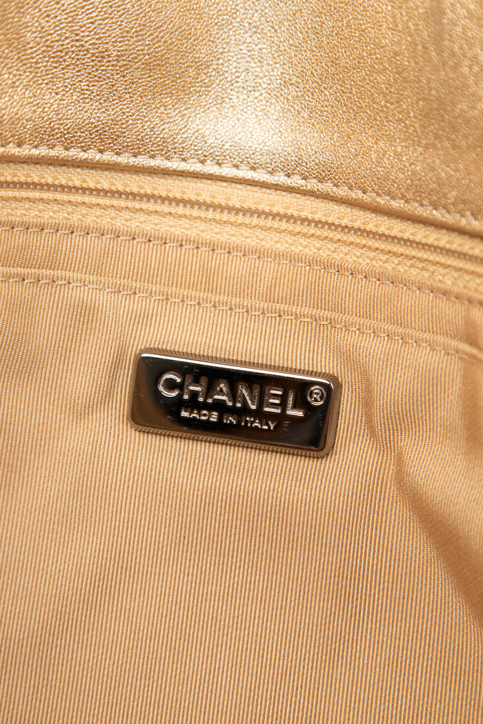 RARE 2010s Chanel Paris-Dubai Gold Perforated Medal Jumbo Flap Bag