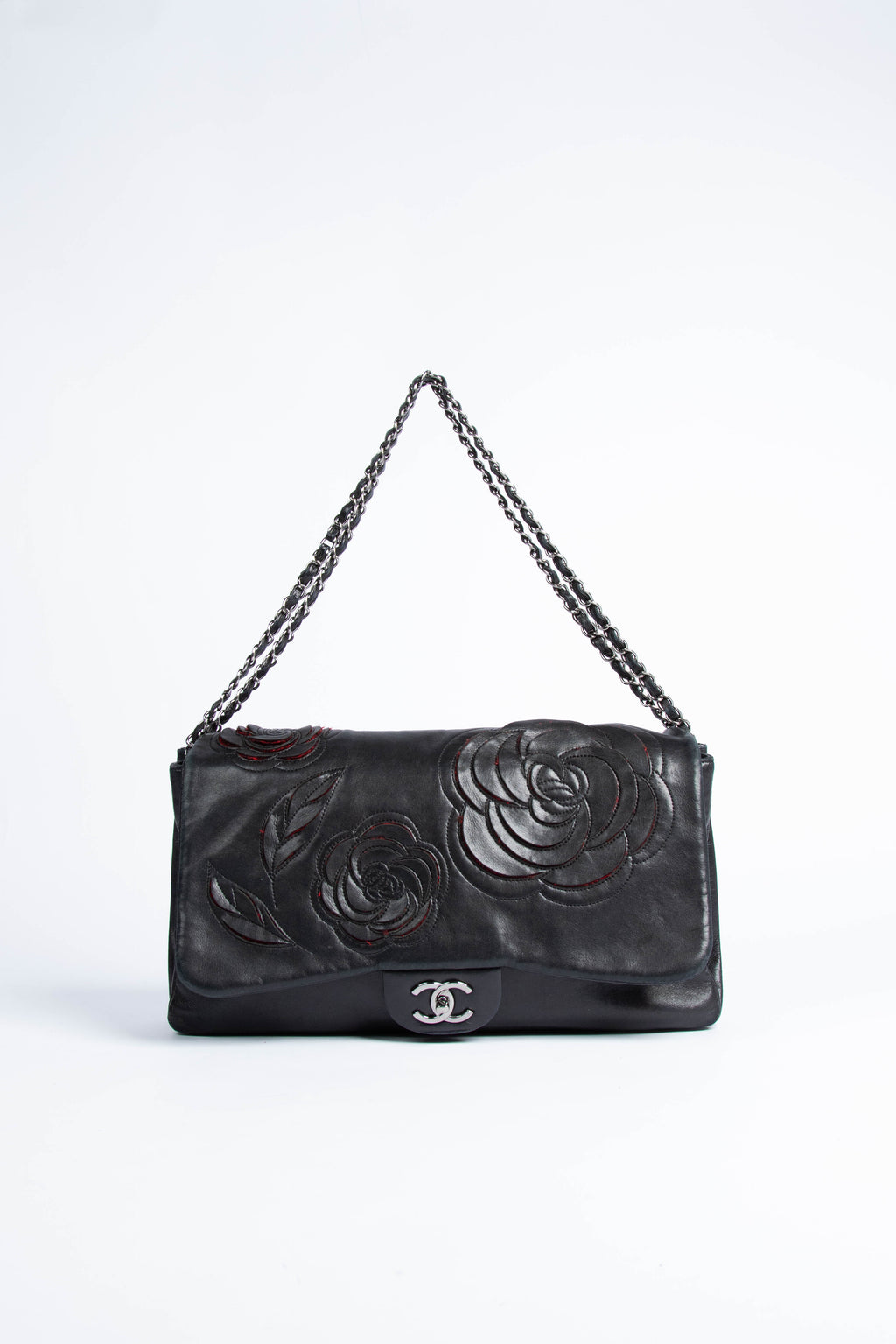 2000s Chanel Black Lambskin Camellia Maxi Single Flap Bag