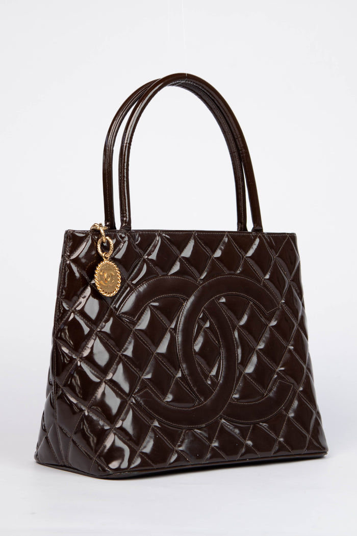 2000s Chanel Brown Patent Leather Gold Medallion Tote Bag