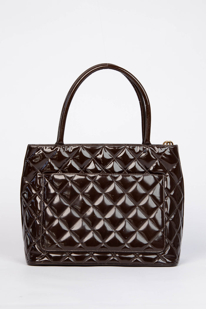 2000s Chanel Brown Patent Leather Gold Medallion Tote Bag