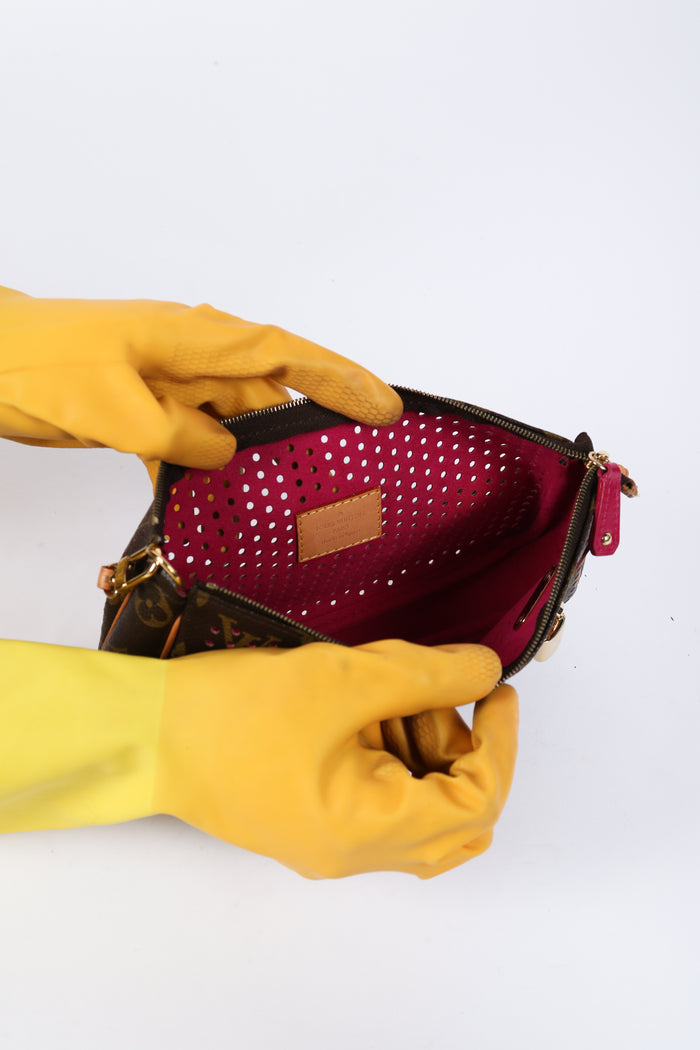LOUIS VUITTON Monogram Perfo Perforated Pochette Accessoires Hand Bag  M95185